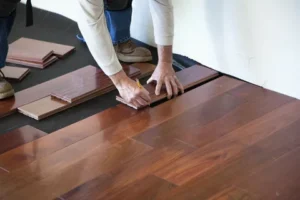Comparison of wood tile flooring and traditional wood in a modern South Florida home showing style and durability differences