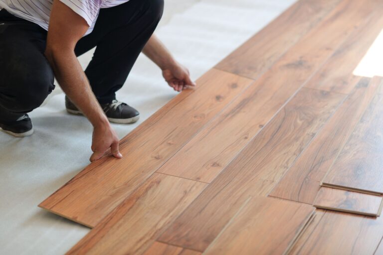 Seamless waterproof laminate flooring installation in modern home