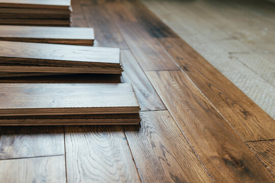 Laminate flooring with realistic wood texture in a bright modern US living room