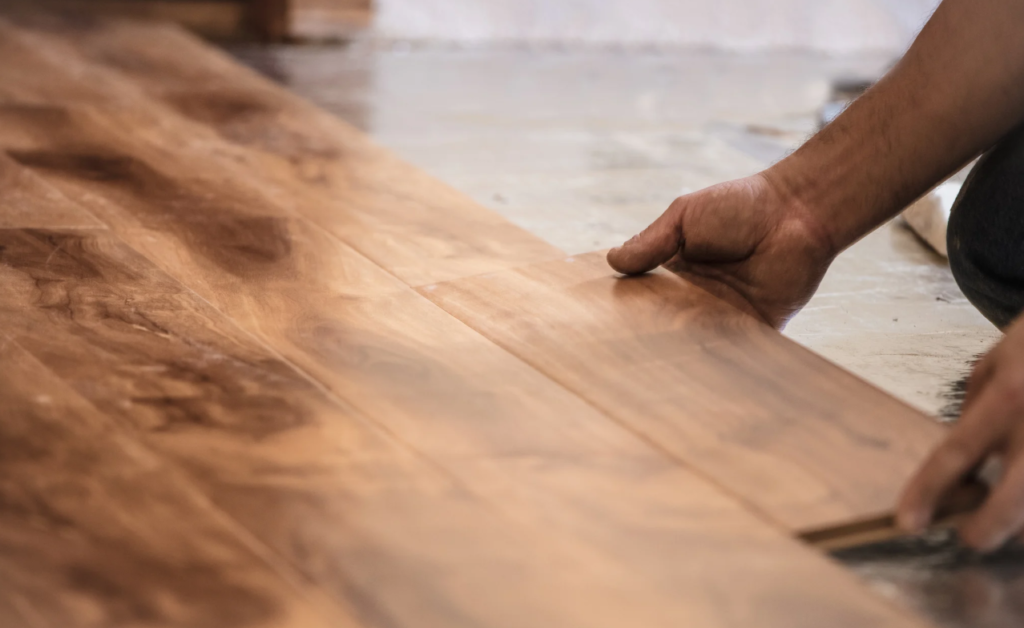Laminate flooring in a modern US home with a natural wood finish and cozy interior design