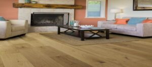 Modern living space featuring bold patterned flooring with vibrant colors, showcasing 2026 interior design trends in a stylish home setting.