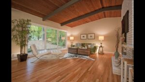 Modern interior showcasing different flooring styles coordinated with furniture and décor to match various home design themes.